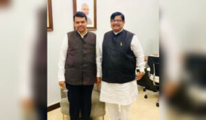 Maharashtra Chief Minister Devendra Fadnavis with former Kulgaon-Badlapur Municipal Council President Ram Patkar during a meeting in Mumbai