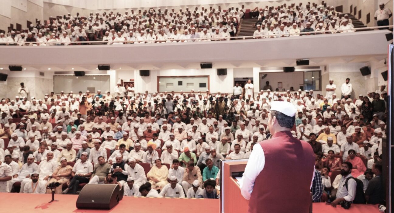 Chief Minister Devendra Fadnavis announcing the agricultural electricity bill waiver package at a farmers' gathering in Maharashtra.