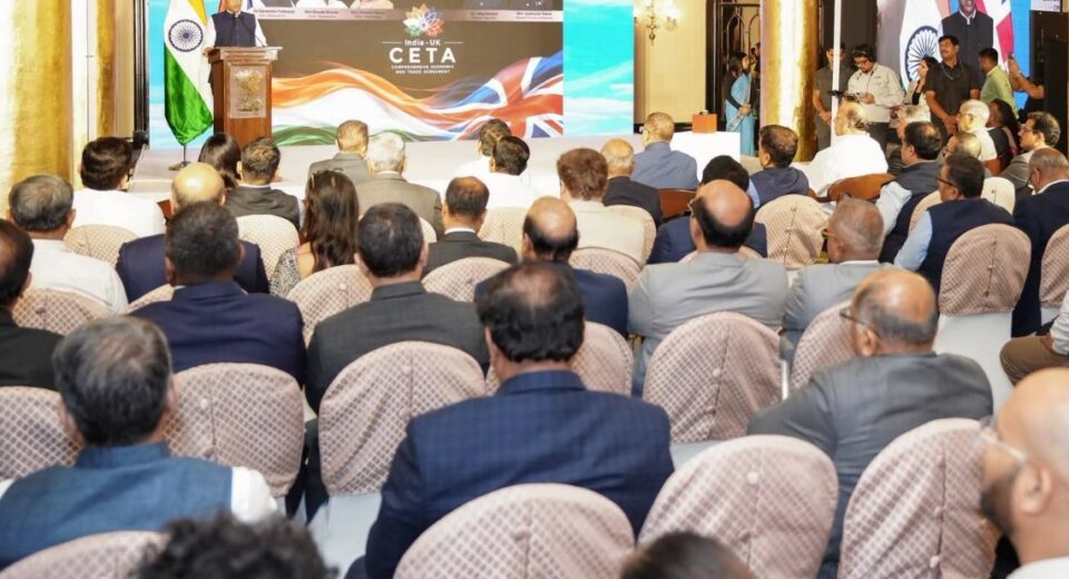 Chief Minister Devendra Fadnavis addresses industry leaders during the launch of the India–UK Comprehensive Economic and Trade Agreement implementation in Mumbai.