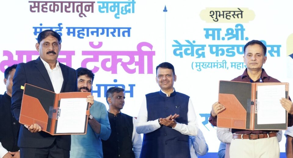 Chief Minister Devendra Fadnavis attends the launch of the Bharat Taxi cooperative mobility service during an event in Maharashtra.
